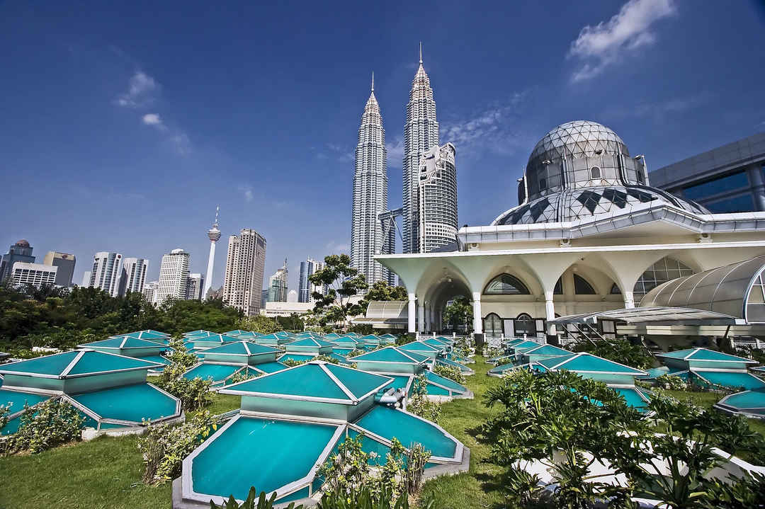 Kuala Lumpur skyline with Petronas Towers and mosque