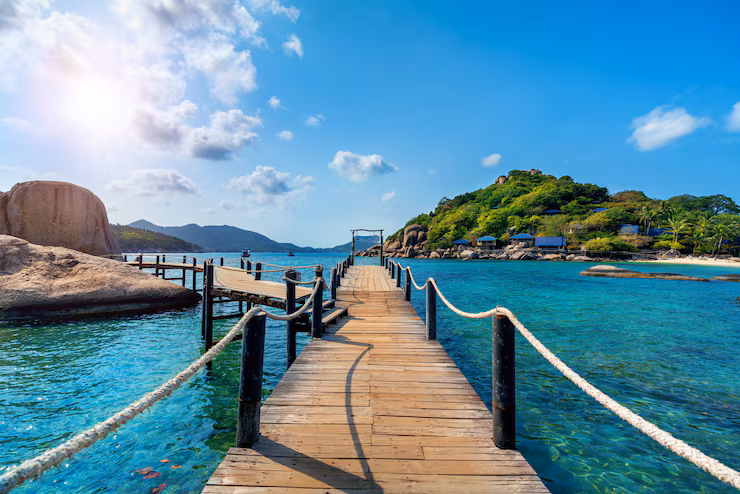 Wooden jetty leading to a tropical island